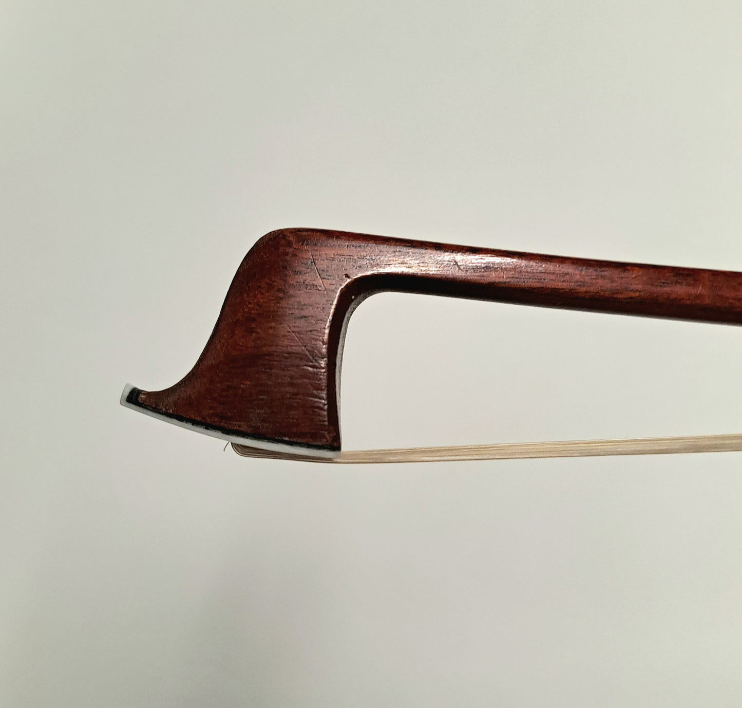 A Nickel-Mounted French Violin Bow by Louis Morizot (Frères)