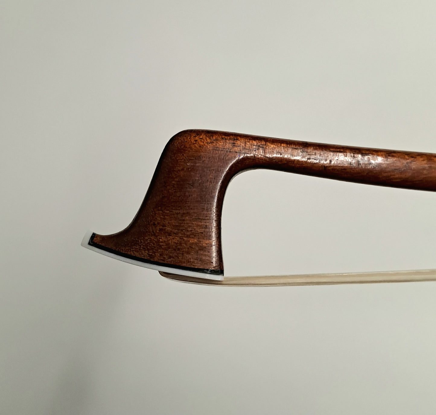 A Nickel-Mounted French Violin Bow by Emile Ouchard, stamped 'Pillot'