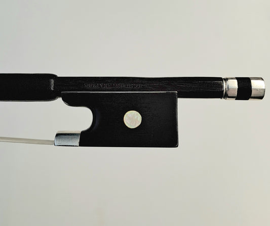 A Silver-Mounted French Violin Bow by Auguste Barbé, circa 1890, stamped 'H.C.Silvestre à Paris'